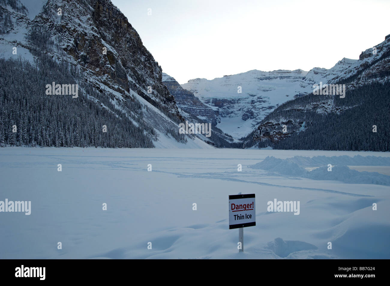 Thin Ice warning sign on Lake Louise, Banff National Park, Alberta, Canada Stock Photo