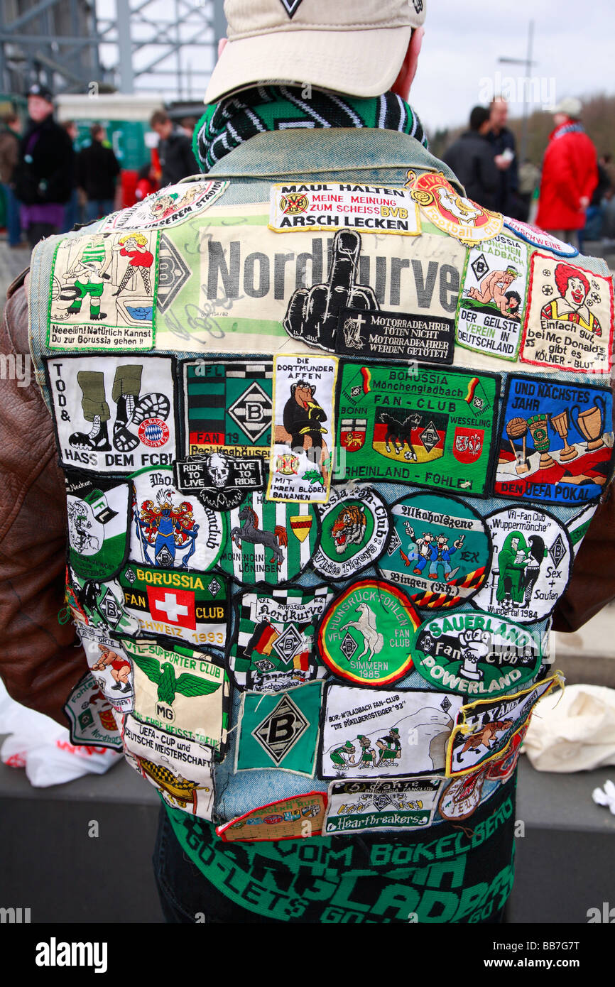 football, Bundesliga, 2008/2009, Borussia Moenchengladbach versus Hanover  96 3:2, stadium Borussia Park in Moenchengladbach, football fan, Borussia  fan, rear view, fan jacket, labels, stickers, logos, patches, D- Moenchengladbach, Niers, Lower Rhine ...