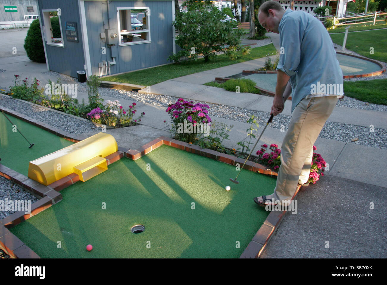 Playing Miniature Golf in Maine Stock Photo