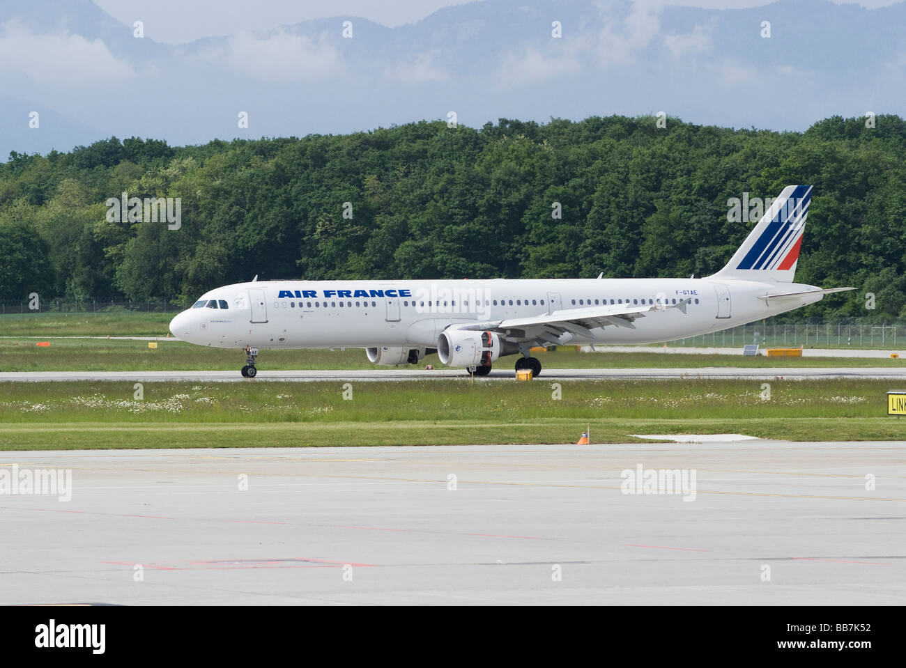 Air France Airbus A321-212 F-GTAE Airliner Landing at Geneva Airport Switzerland Geneve Suisse Stock Photo