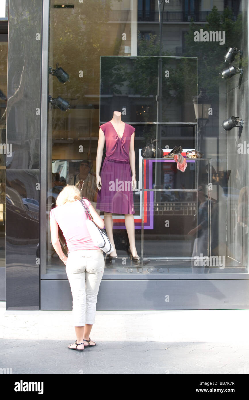 Window shopping in Barcelona Spain Stock Photo