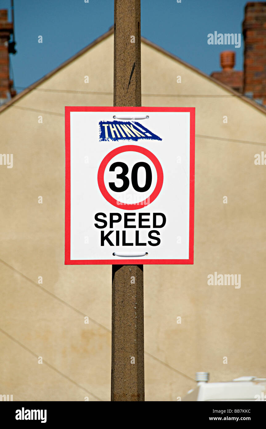 speed kills road thirty sign limit 30 warning message Stock Photo - Alamy