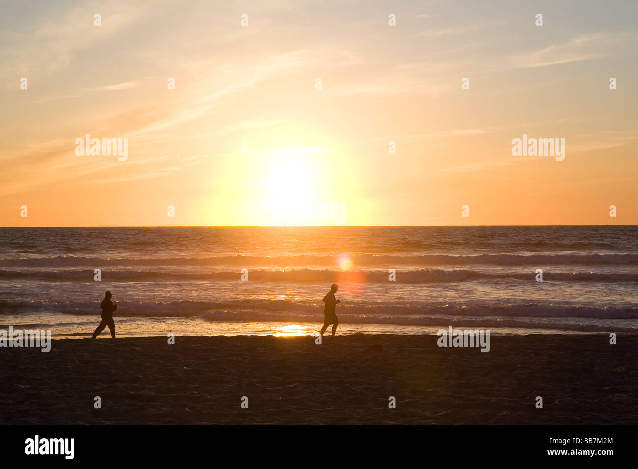 Sunset over the Pacific Ocean at Mission Beach in San Diego Southern California USA Stock Photo