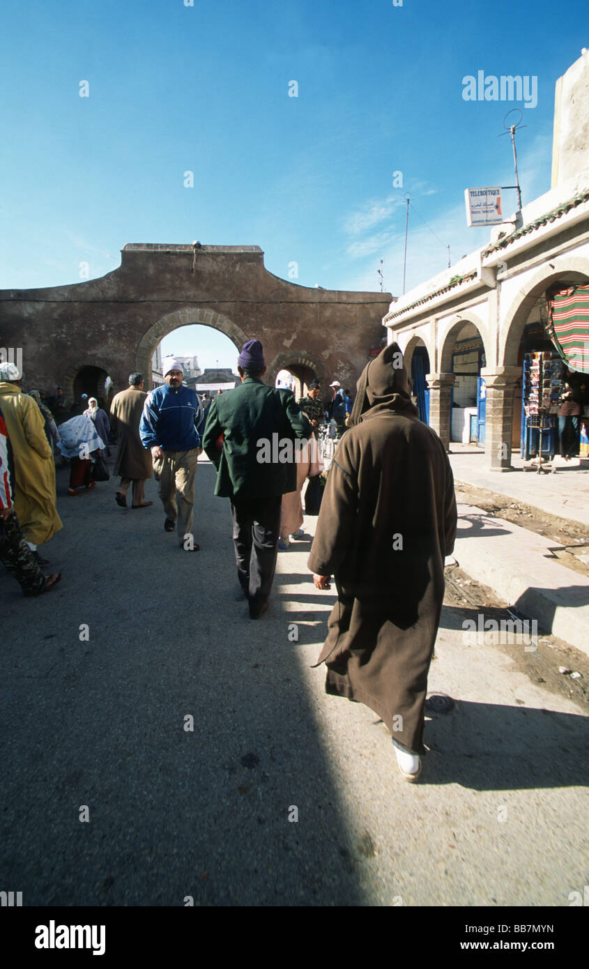 Busy street life with moroccon people on Rue Mohamed el-Qori, medina of Essaouira, Morocco Stock Photo