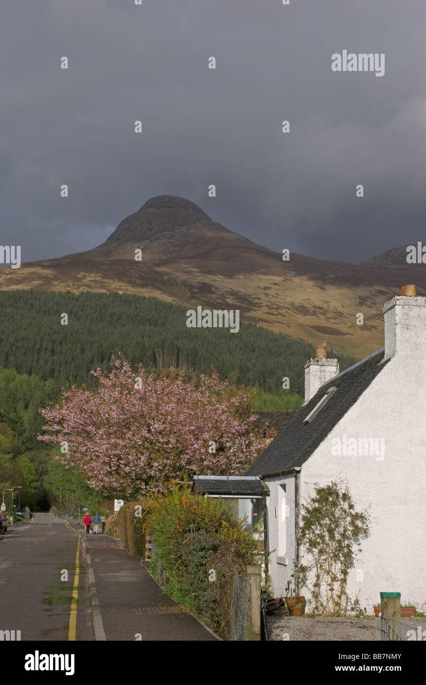 Looking up Glencoe village main street to Pap of Glencoe Highland Region Scotland April 2008 Stock Photo