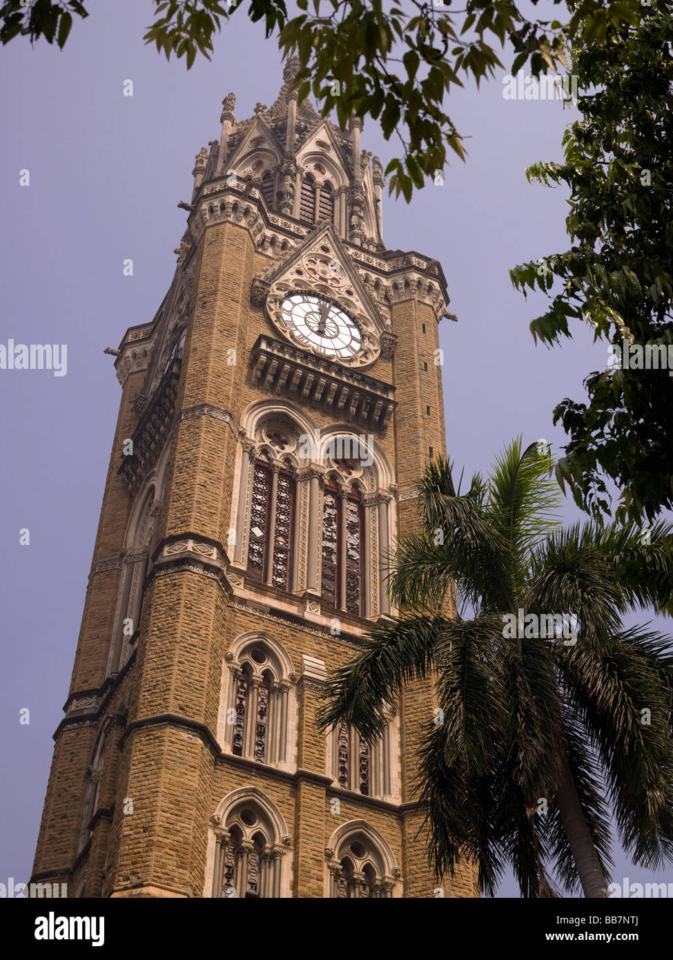 Low angle view of Rajabai Tower; Mumbai, India Stock Photo