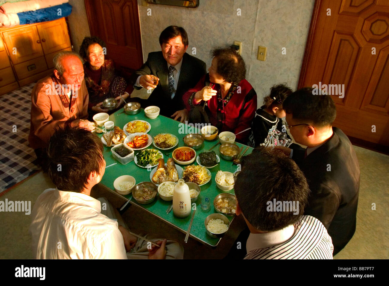 On The Lunar New Year A Family Shares A Ceremonial Meal Together In Stock Photo Alamy On The Lunar New Year A Family Shares A Ceremonial Meal Together In Stock Photo Alamy