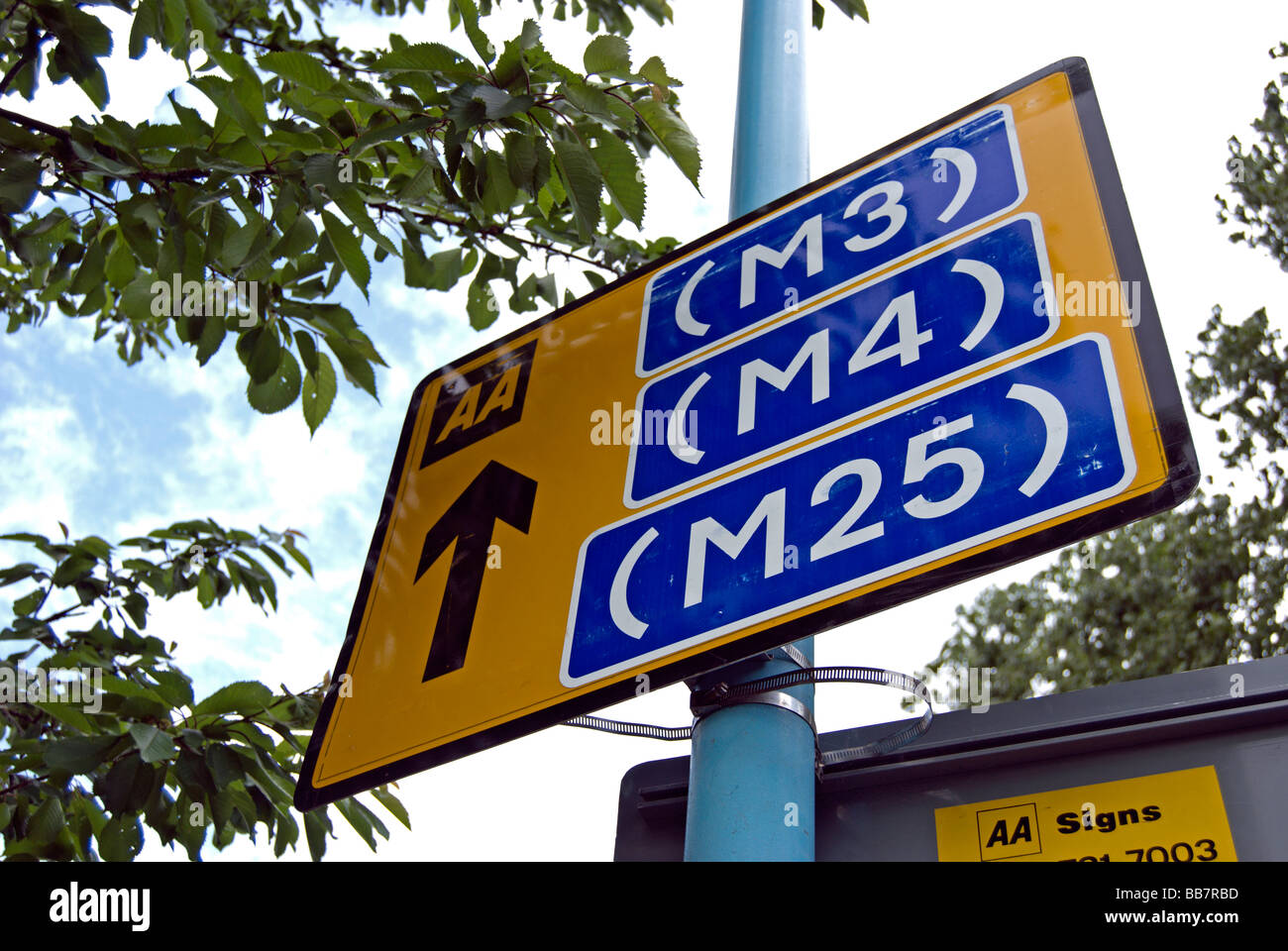 british aa road sign showing directions to motorways m3, m4 and m25, adjacent to twickenham stadium, middlesex, england Stock Photo