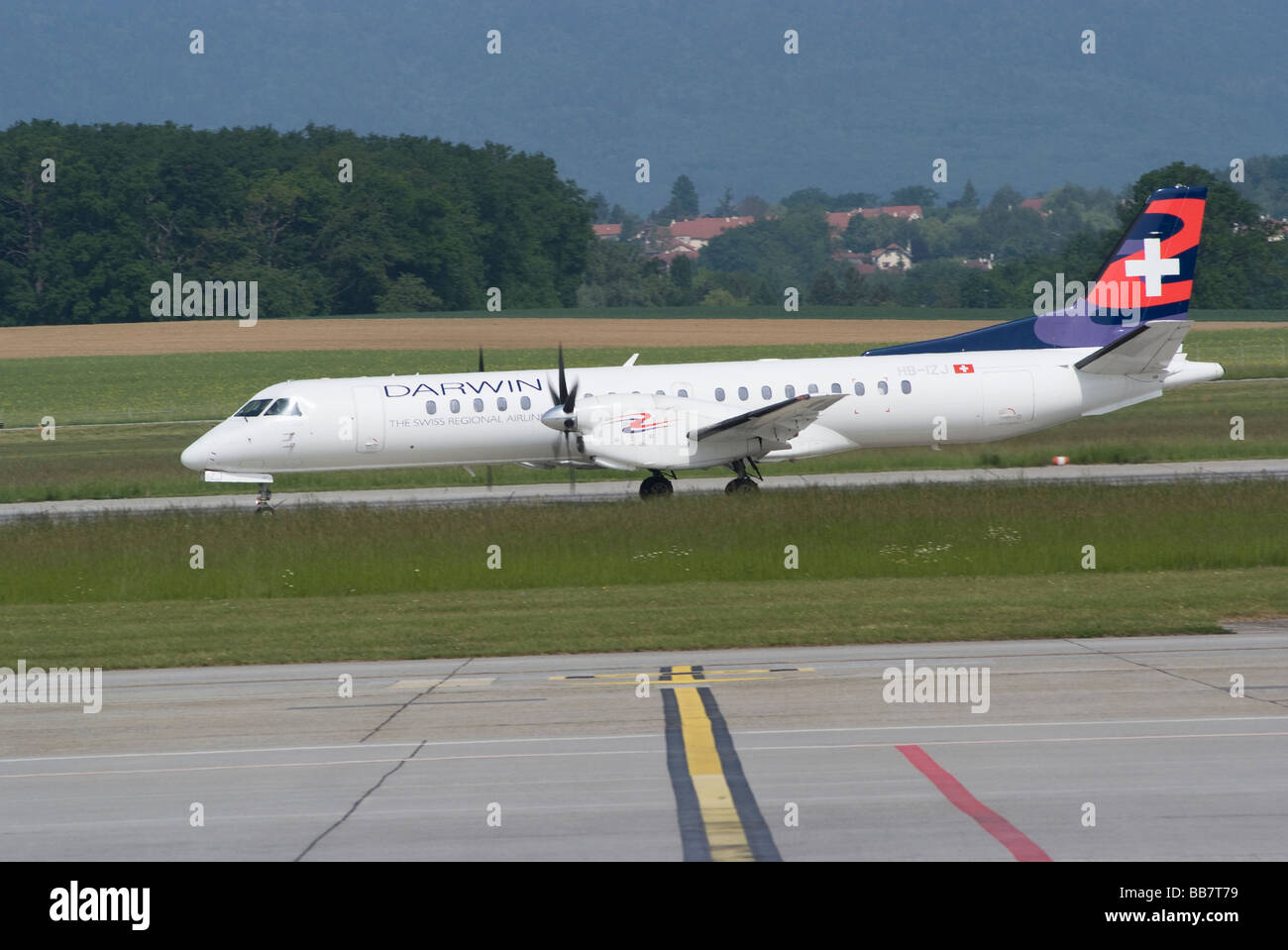 Darwin Airline Saab 2000 Turboprop Airliner HB-IZJ Landing at Geneva Airport Switzerland Geneve Suisse Stock Photo