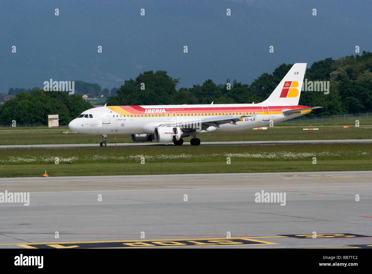 Iberia Airlines Airbus A320-214 EC-ILR Airliner Landing at Geneva Airport Switzerland Geneve Suisse Stock Photo