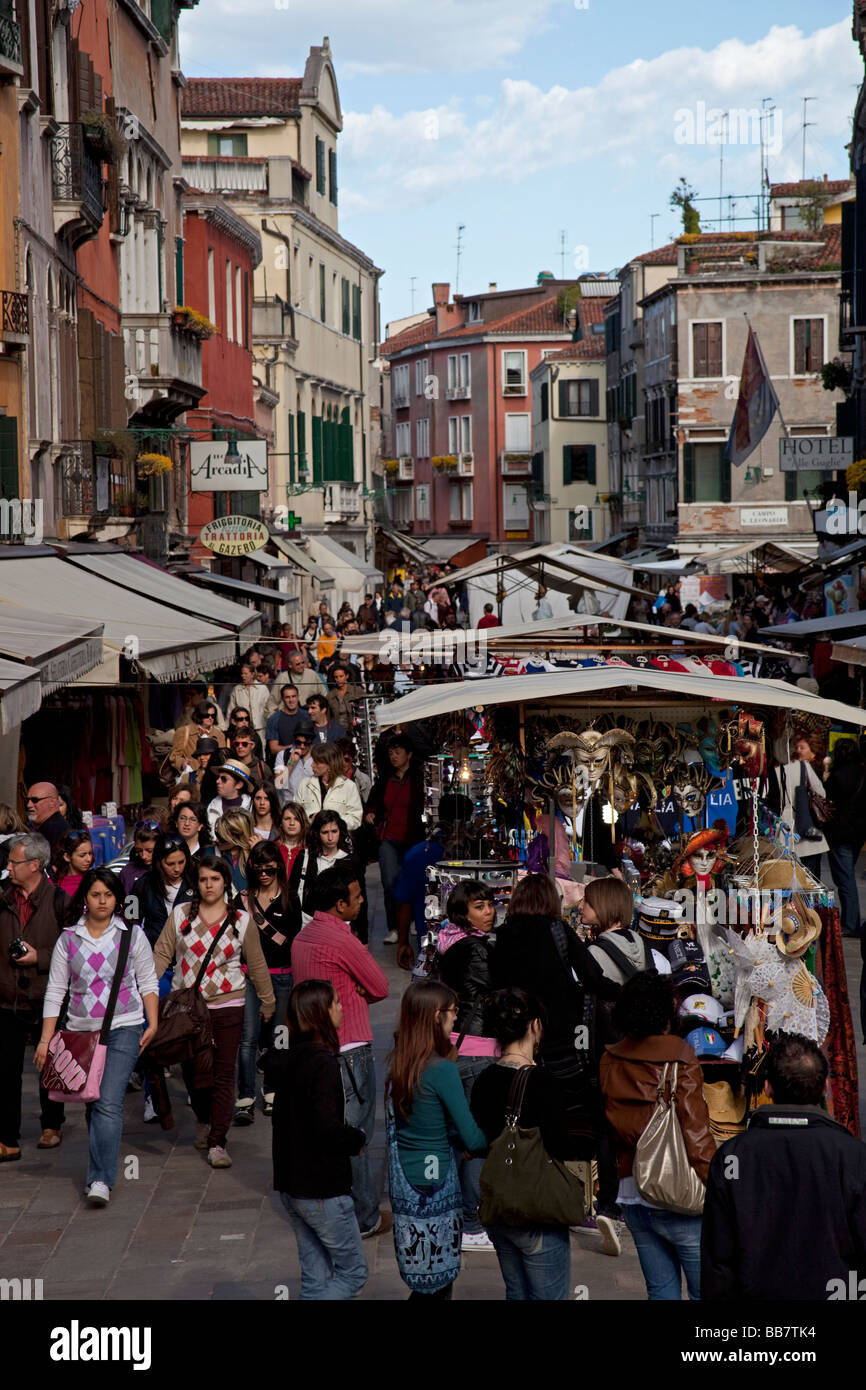 Stalls in busy shopping street, Venice, Italy Stock Photo