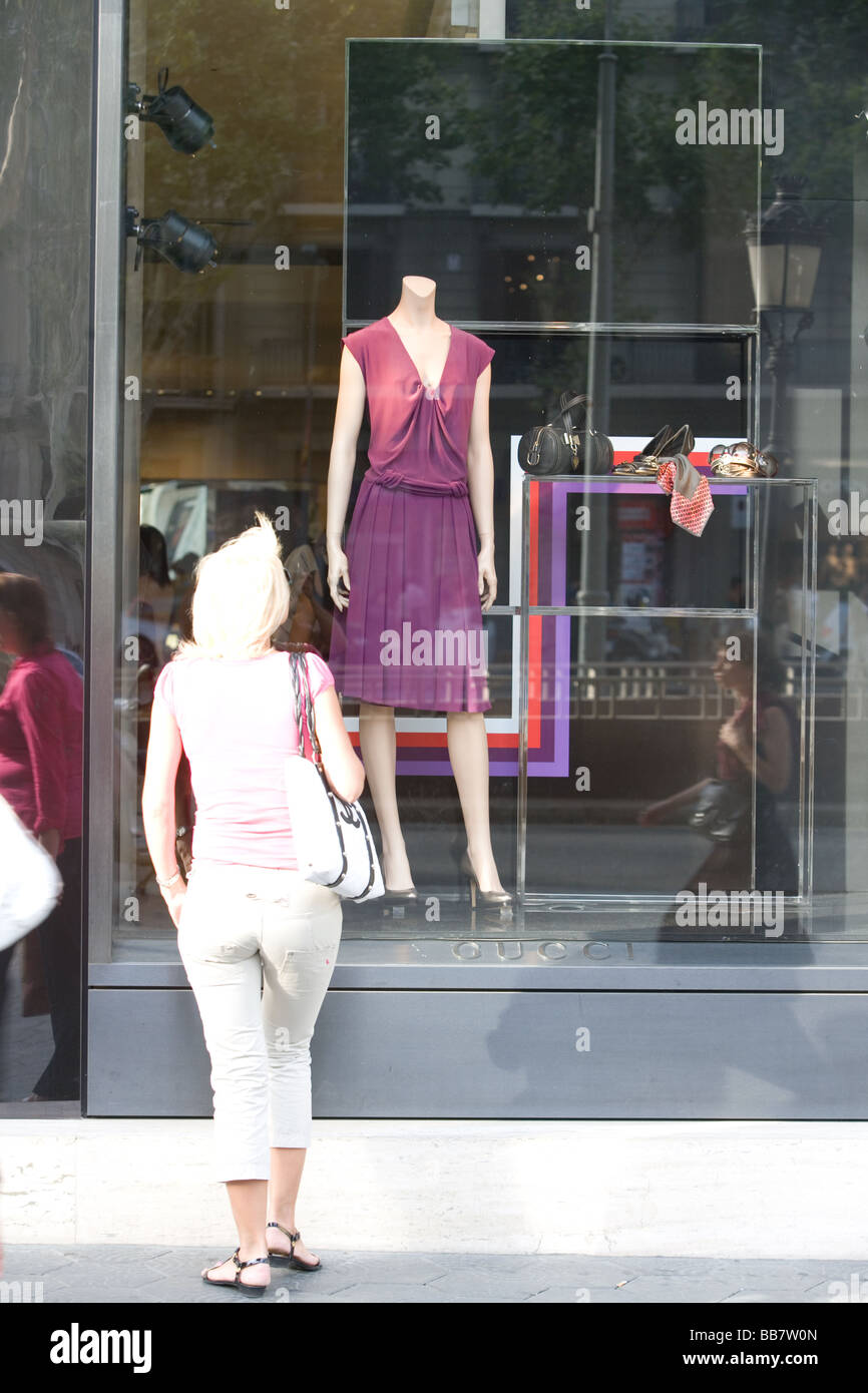 Window shopping in Barcelona Spain Stock Photo