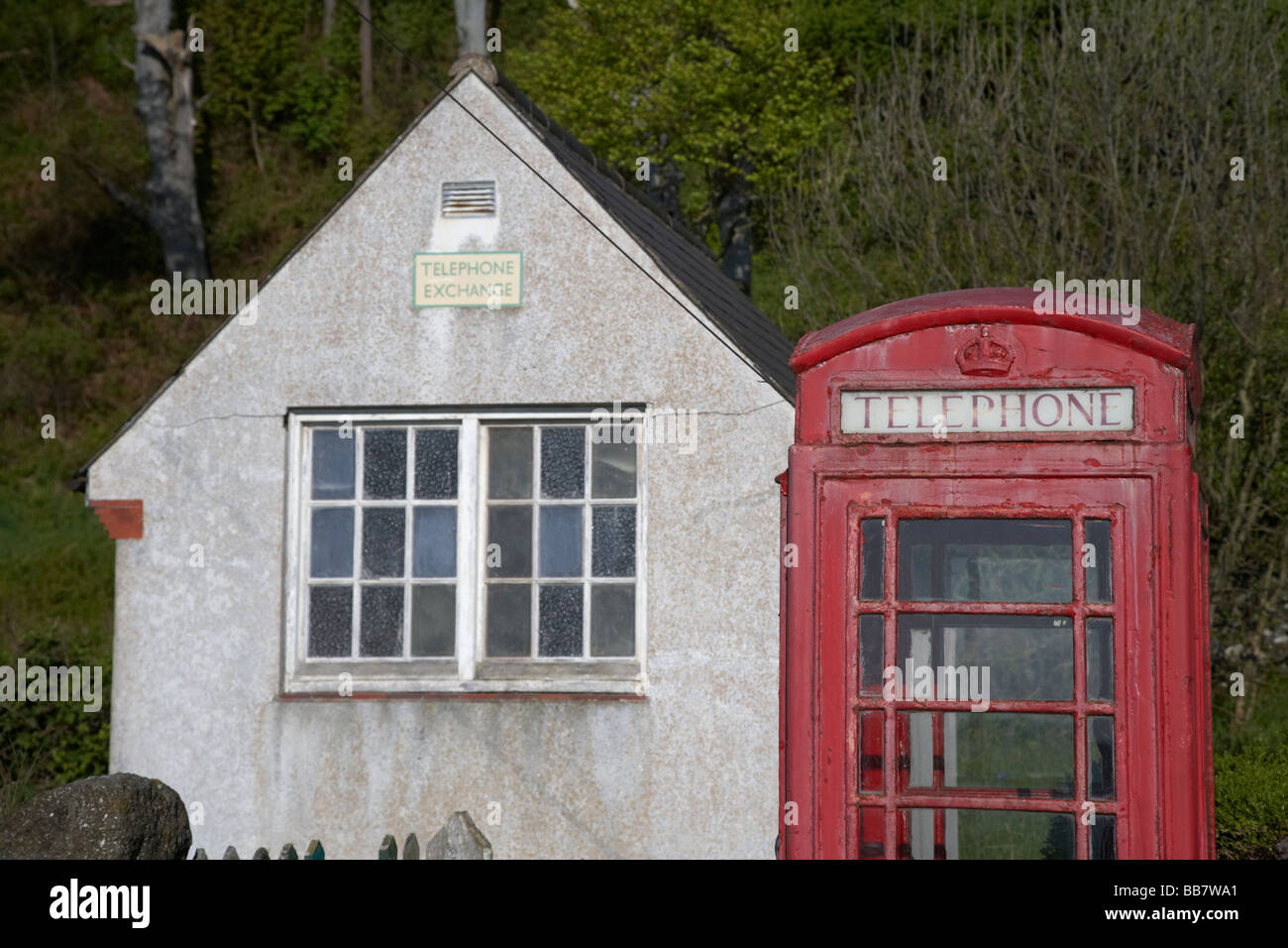 tiny small telephone exchange and red telephone box Stock Photo