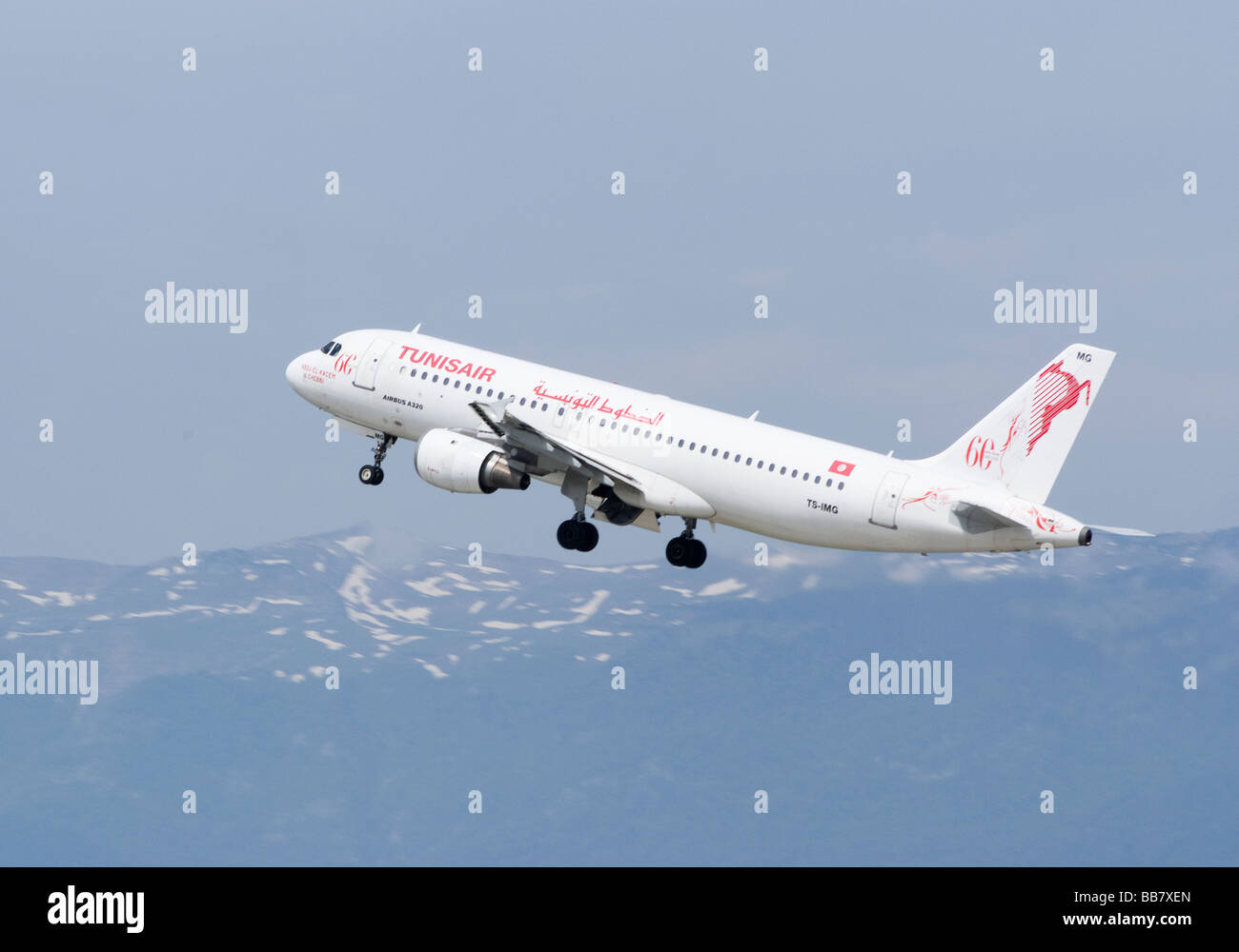 Tunisair Airbus A320-211 TS-IMG Airliner Taking Off from Geneva Airport Switzerland Geneve Suisse Stock Photo