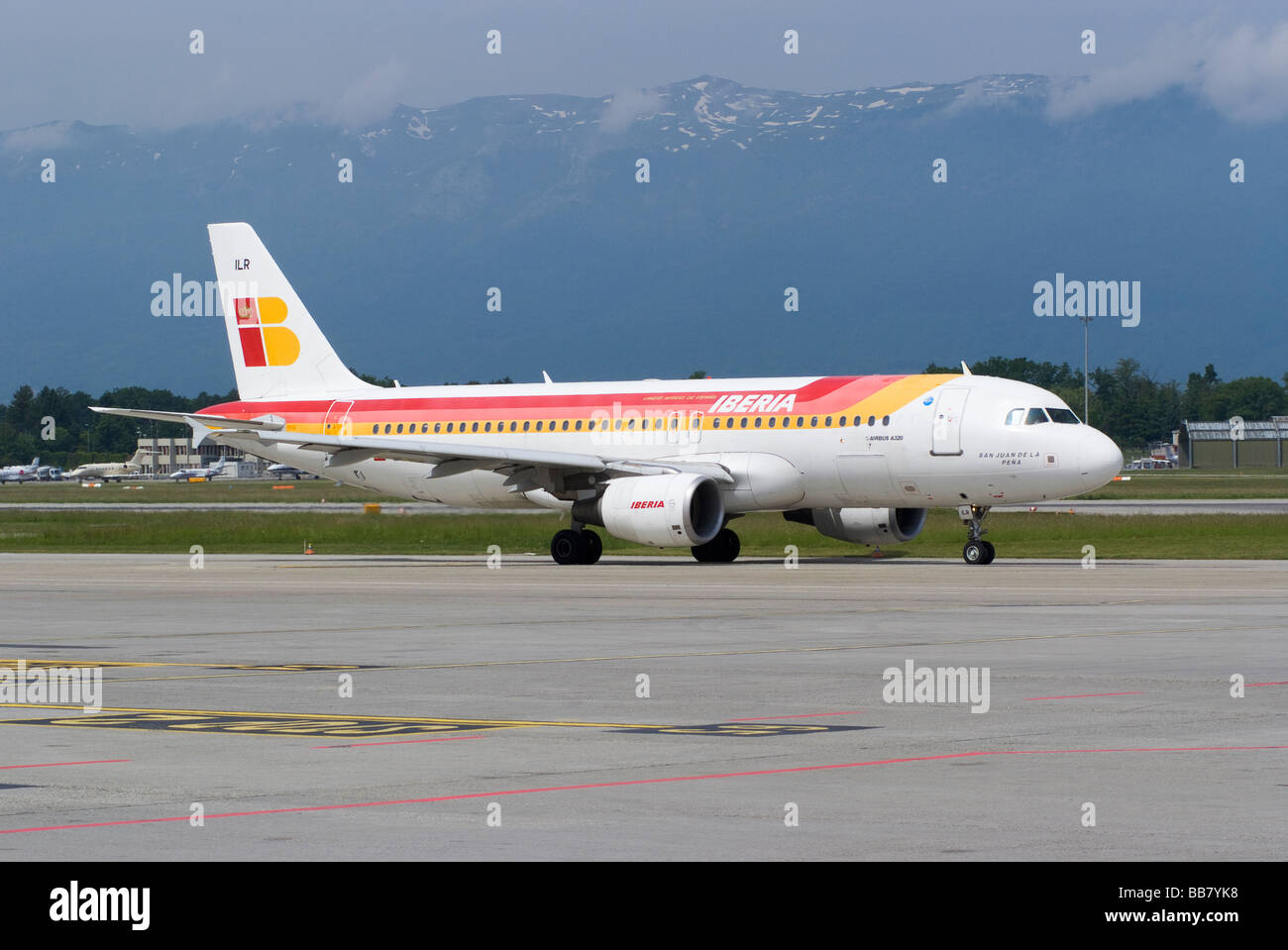 Iberia Airbus A320-214 EC-ILR Airliner Taxiing at Geneva Airport Switzerland Geneve Suisse Stock Photo