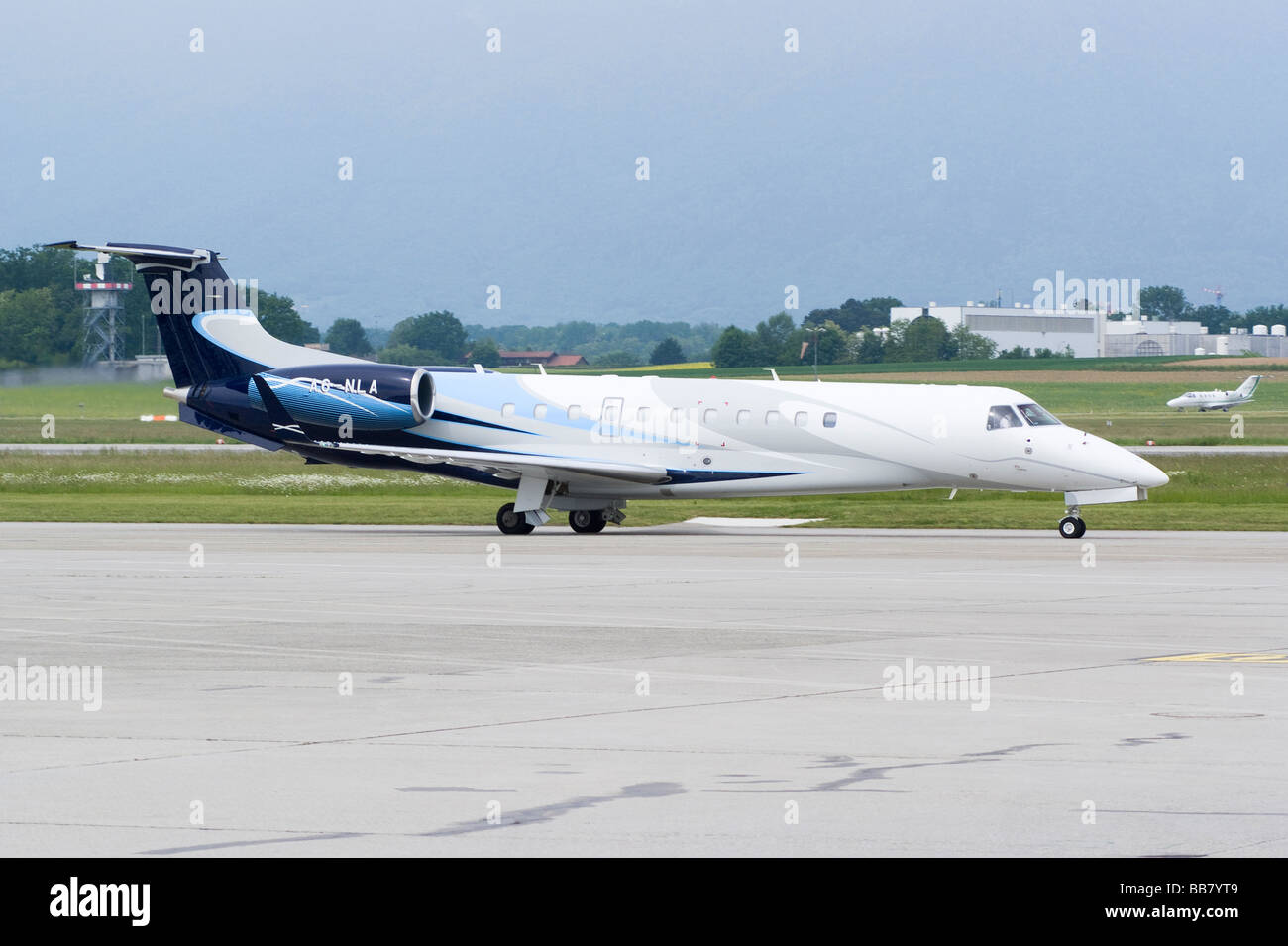 An Embraer ERJ-135BJ Legacy 600 Business Jet A6-NLA Taxiing at Geneva Airport Switzerland Geneve Suisse Stock Photo