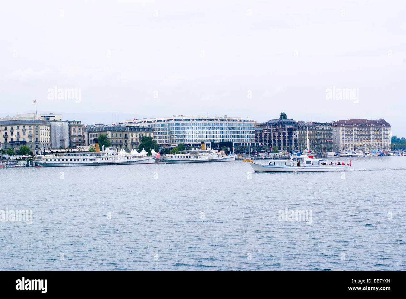 Tourist Boats at Quai du Mont Blanc on Lake Geneva, Geneva City Geneve Suisse Switzerland Stock Photo