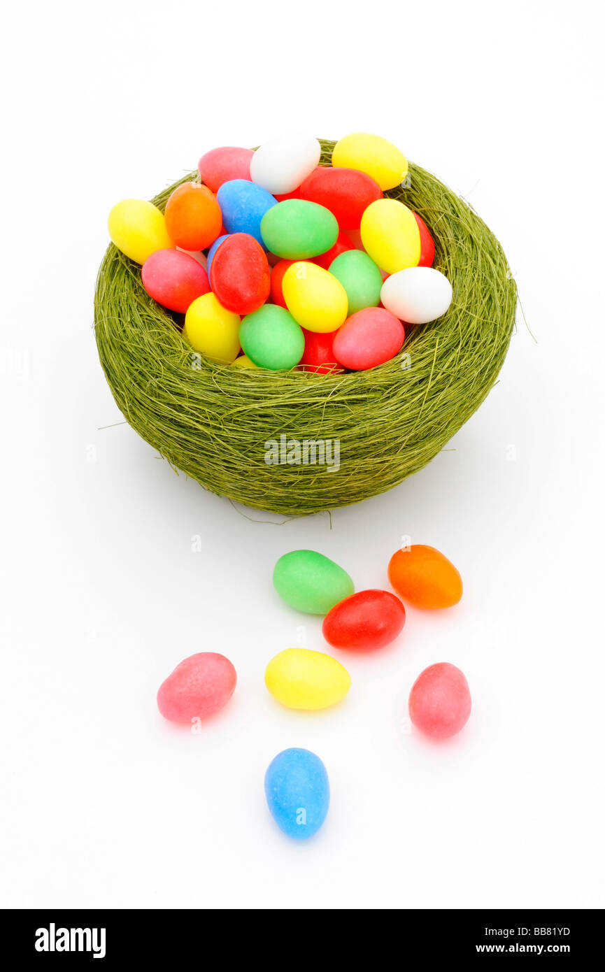 Candy easter eggs in an easter basket Stock Photo
