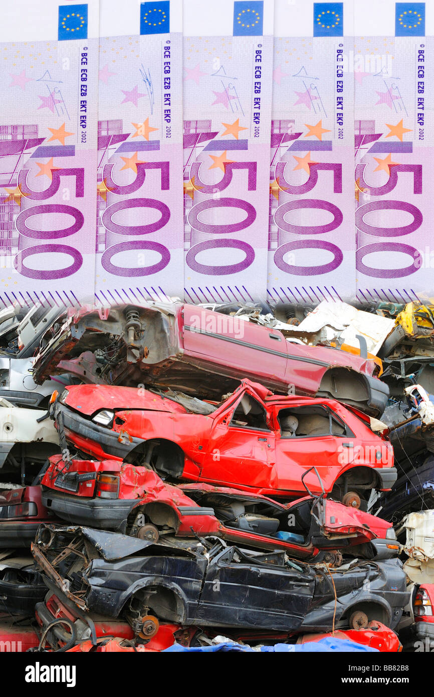 Junk cars, bank notes, symbolic picture for scrapping premium Stock Photo