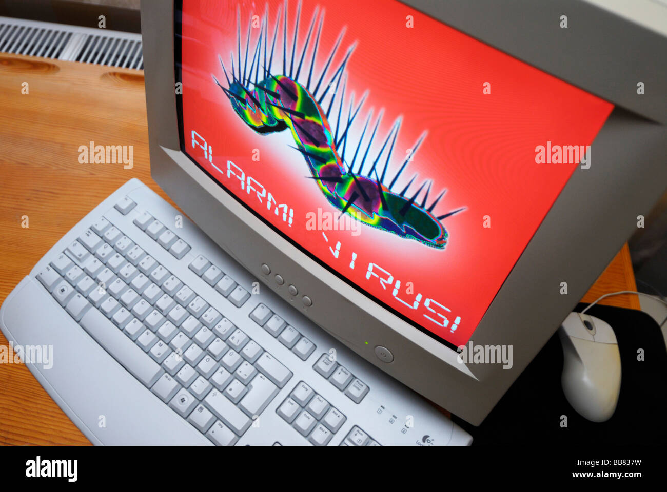 Virus warning on a computer monitor Stock Photo - Alamy