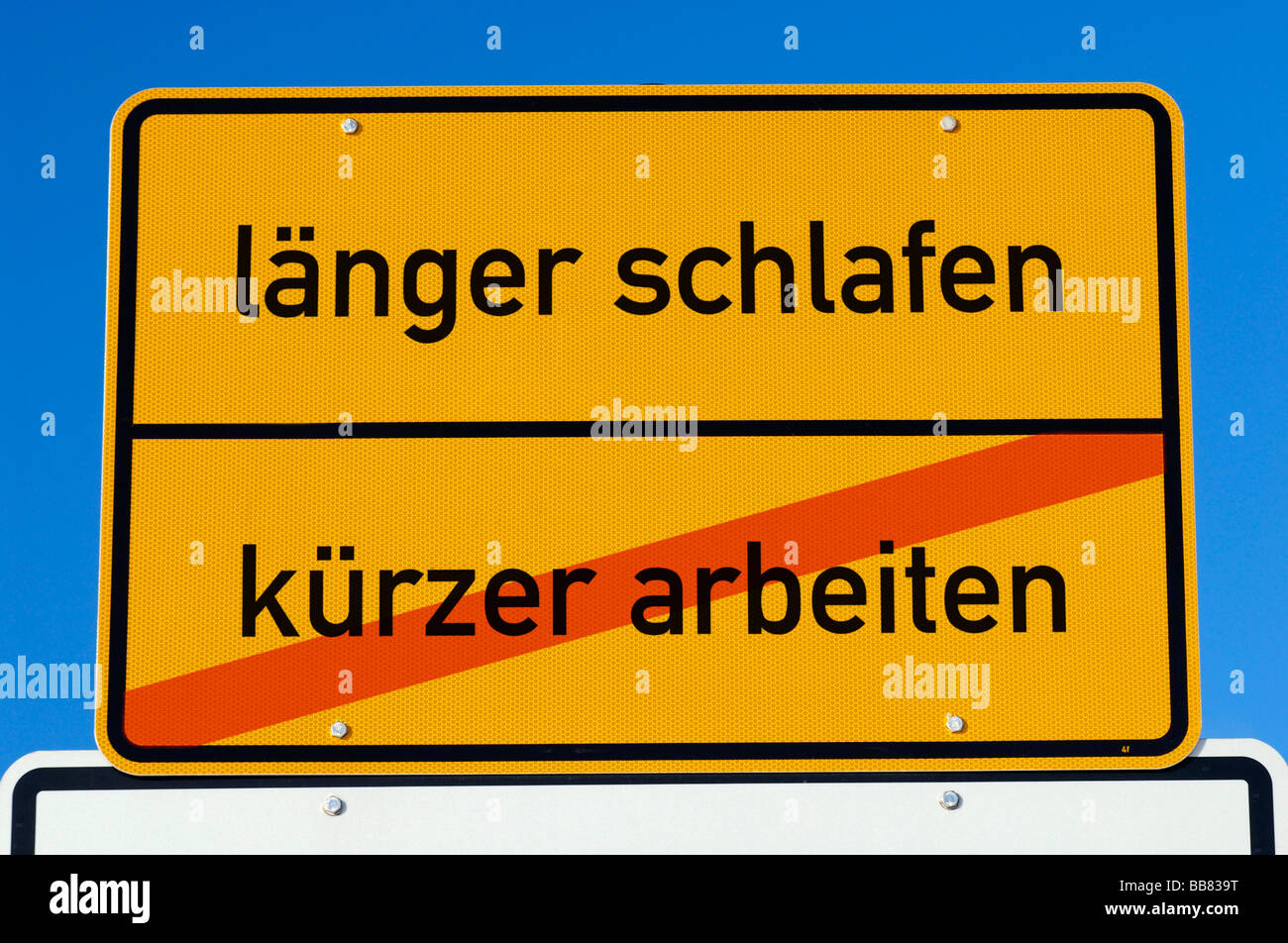 Place name sign bearing the words 'laenger schlafen kuerzer arbeiten', German for sleep longer, work shorter', symbolic of shor Stock Photo