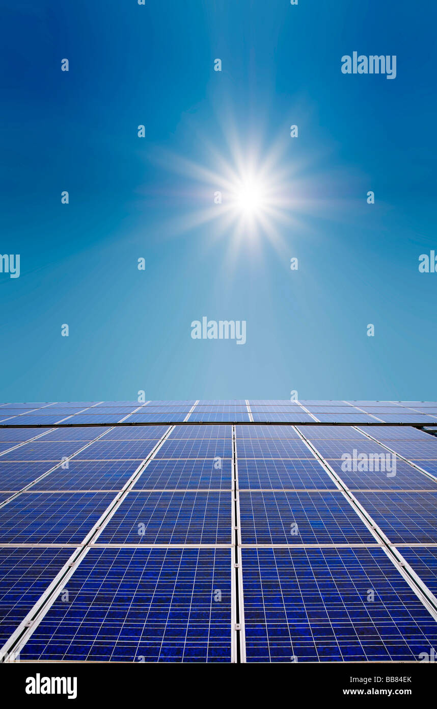 Photovoltaic system with sun and sunrays Stock Photo