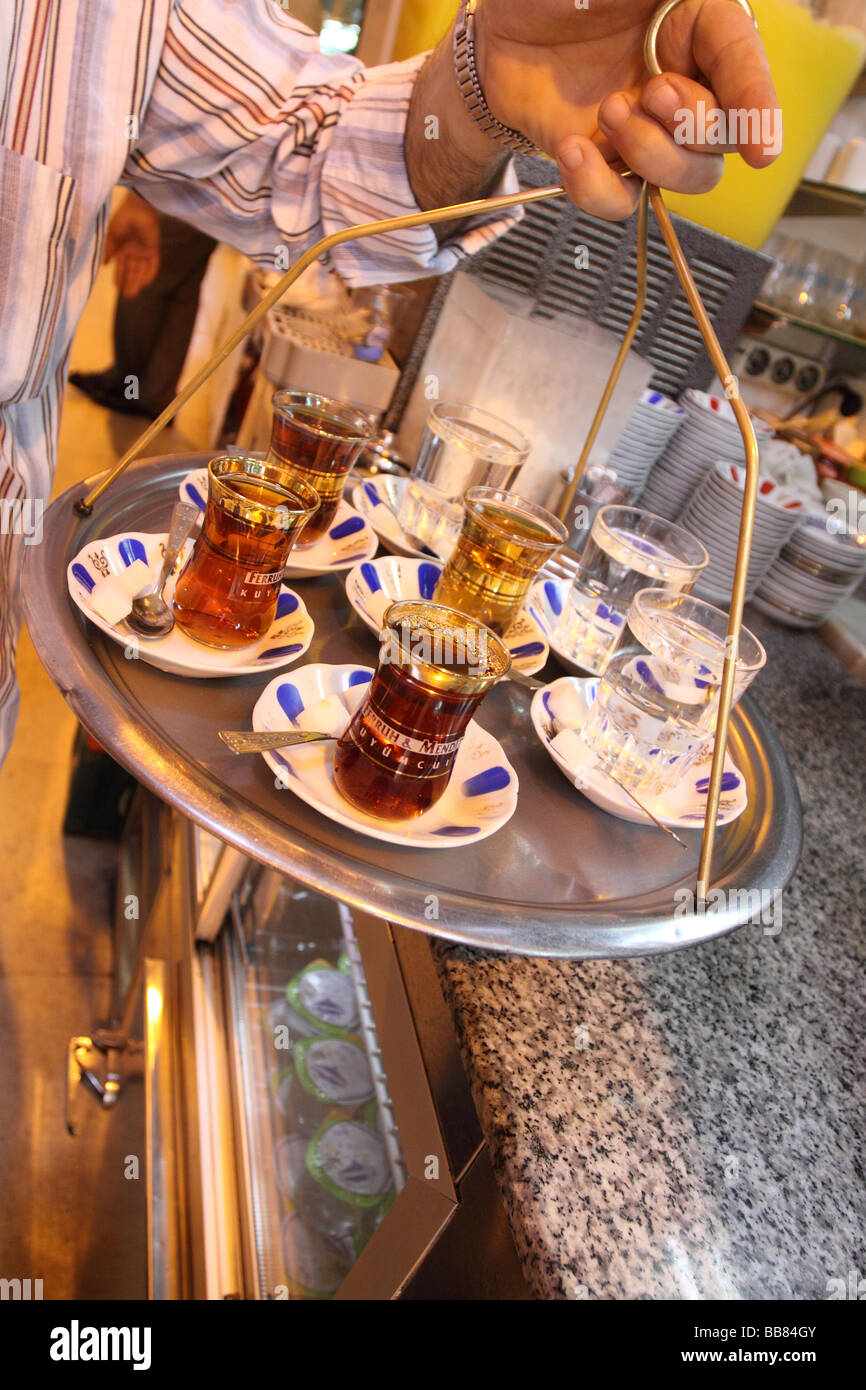 Istanbul Turkey tea seller with a tray full of fresh black sweet tea in the Grand Bazaar Stock Photo