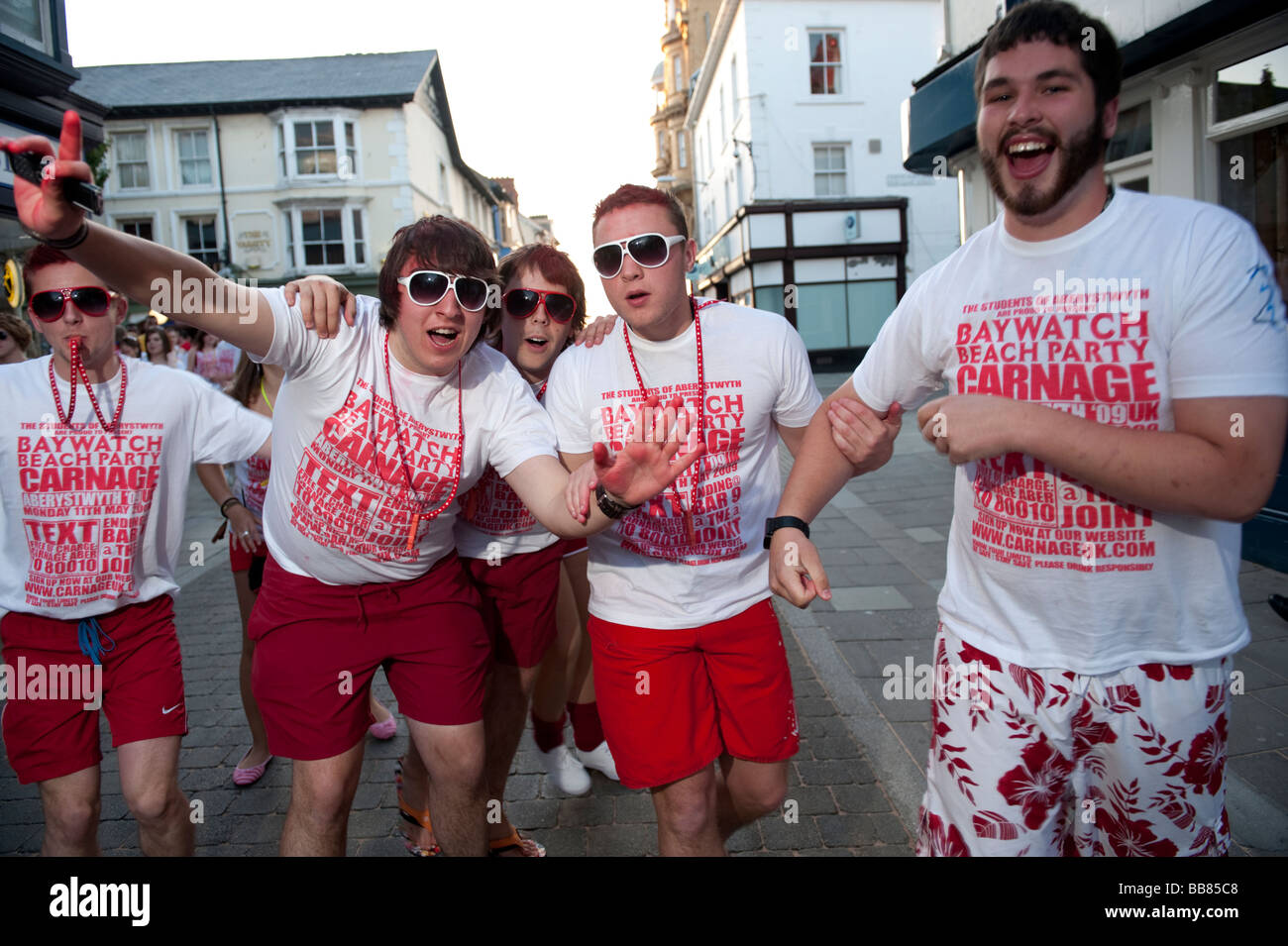 Aberystwyth University Students on a CARNAGE baywatch themed organised pub crawl around the town May 11 2009 Stock Photo