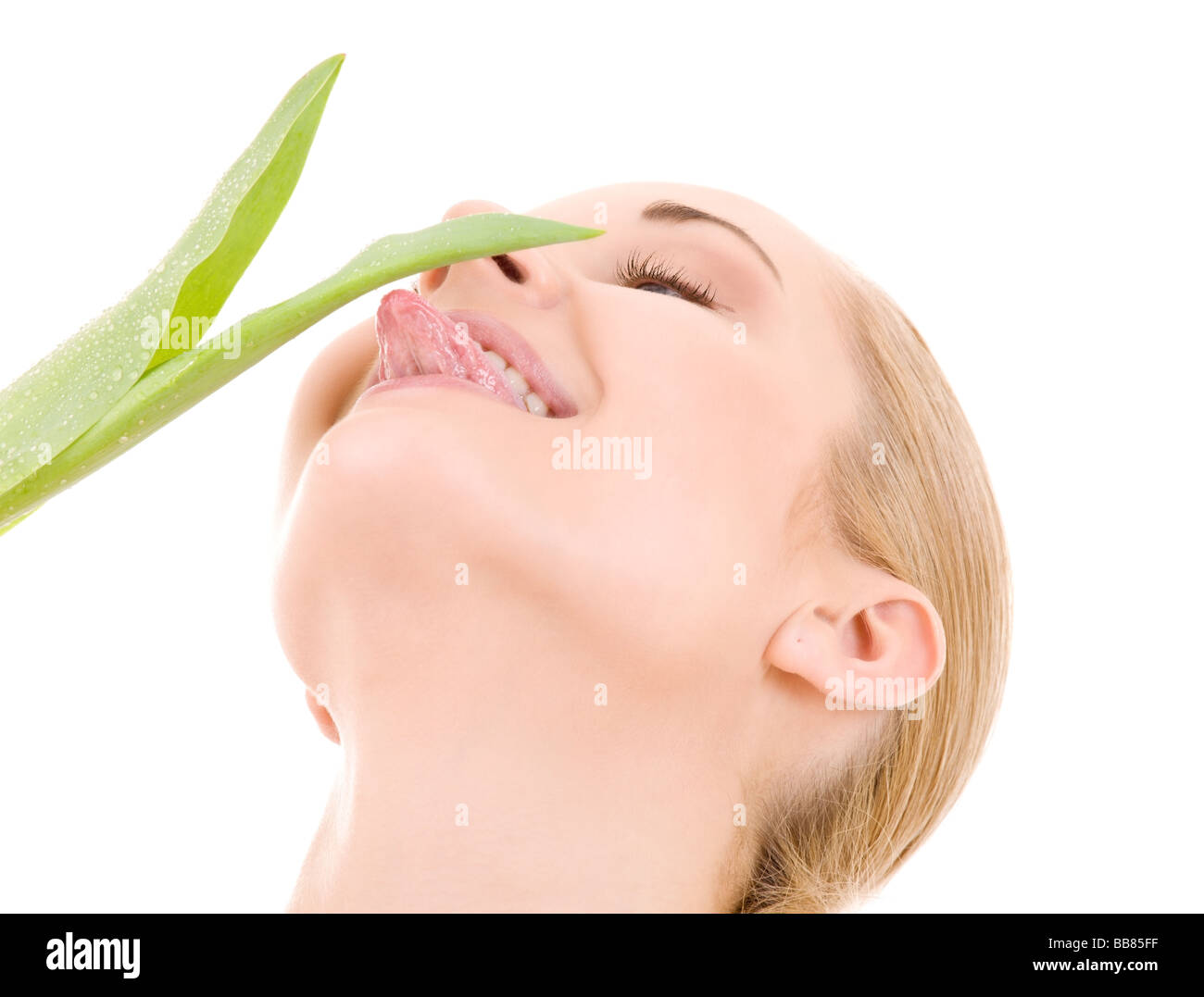 picture of happy woman with green leaf over white Stock Photo - Alamy