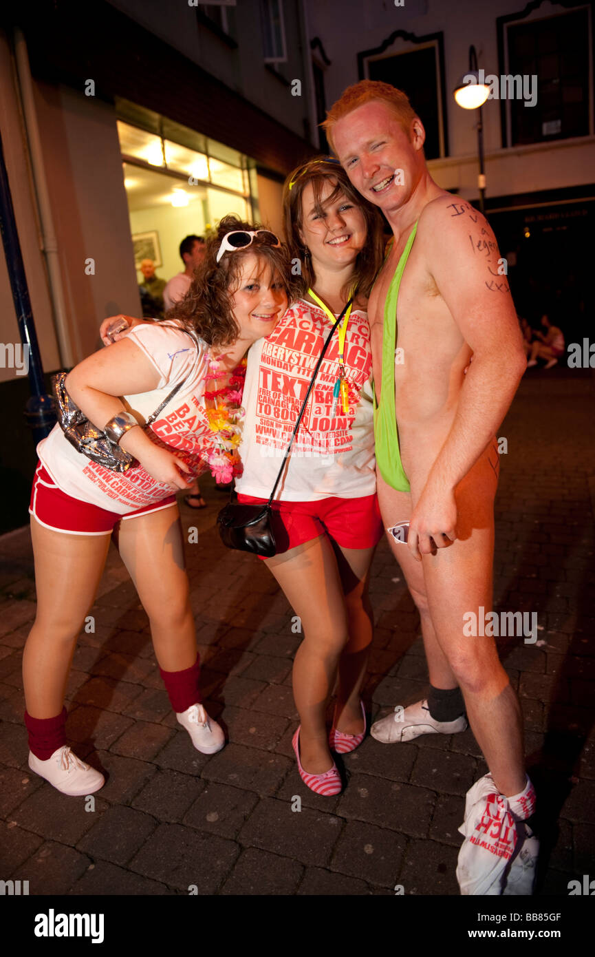 Three Aberystwyth University Students on a CARNAGE baywatch themed organised pub crawl around the town May 11 2009 Stock Photo