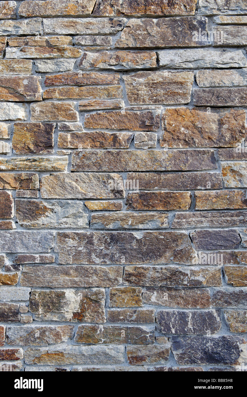Stone wall, brick facade, gneiss wall Stock Photo