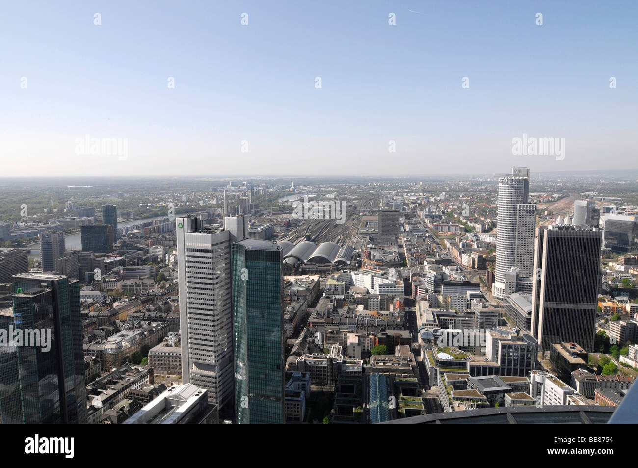 Frankfurt's skyline as seen from Maintower viewing platform, central, train station with tracks, to its left, Dresdner Bank bui Stock Photo