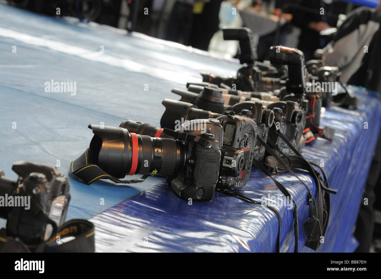 Digital single-lens-reflex cameras belonging to professional sport photographers laying at the ready on ringside, Stuttgart Bad Stock Photo