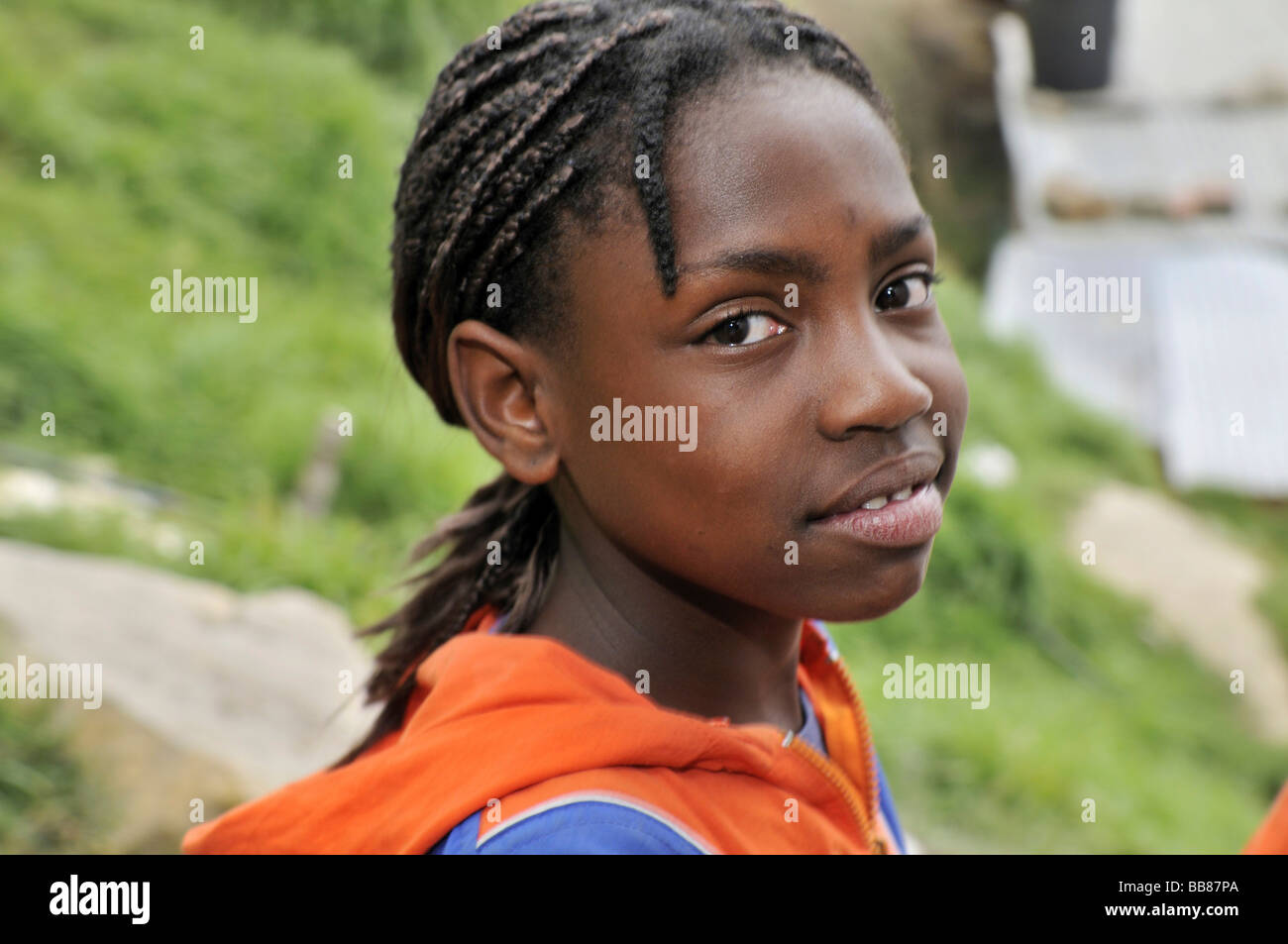 Eleven year old dark-skinned girl, slums of Alto de Cazuca, Soacha, Bogotá, Columbia Stock Photo