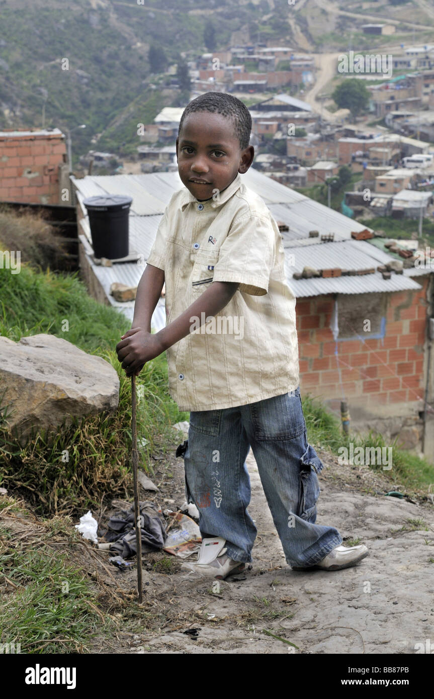 Six year old dark-skinned boy, slums of Alto de Cazuca, Soacha, Bogotá, Columbia Stock Photo