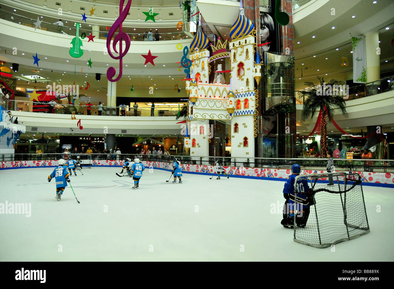 Children playing icehockey on the ice rink of the AlAinMall, Al Ain