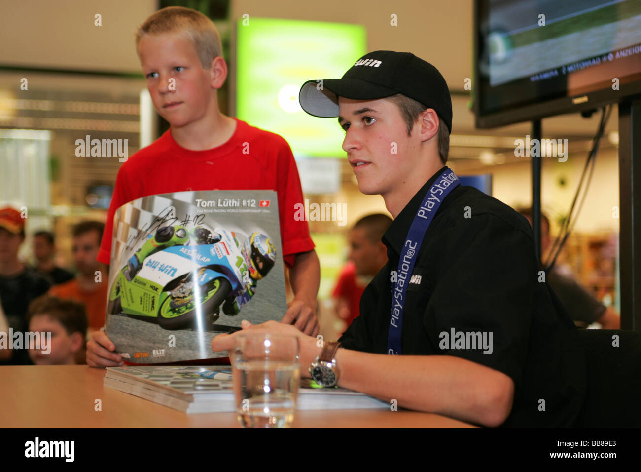 Swiss motorcycle road racer Thomas Luethi during an autograph session at Emmencenter in Emmen, Switzerland Stock Photo