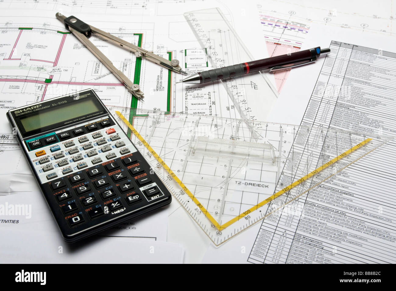 Project planning, construction plan with pocket calculator, compass, mechanical pencil, ruler, triangle and check list Stock Photo