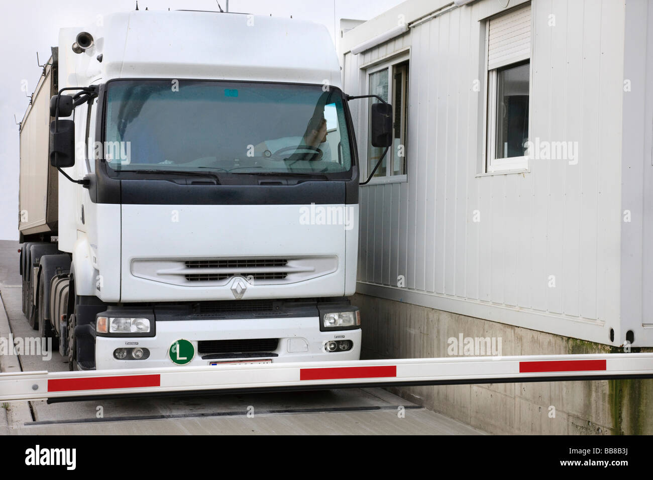 Truck at a control point of an industrial plant Stock Photo