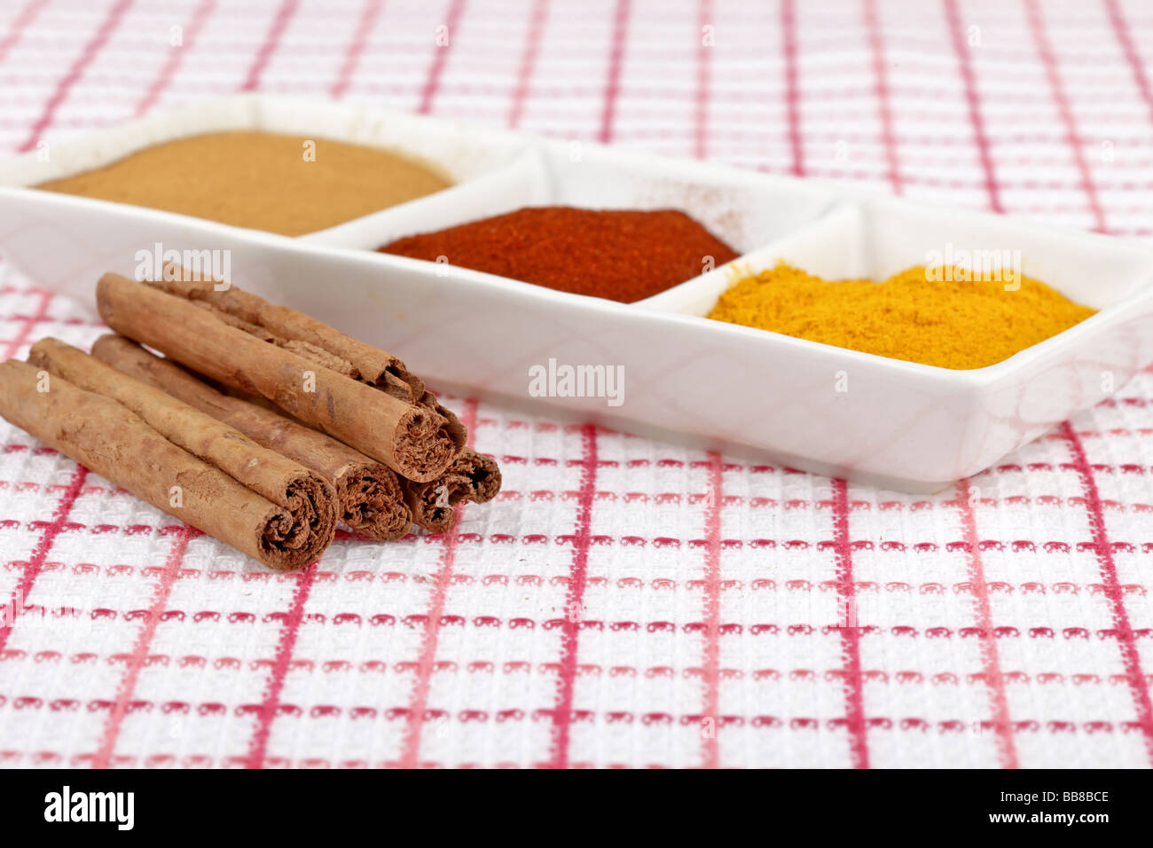 Cinnamon sticks with other spices used in cooking Stock Photo