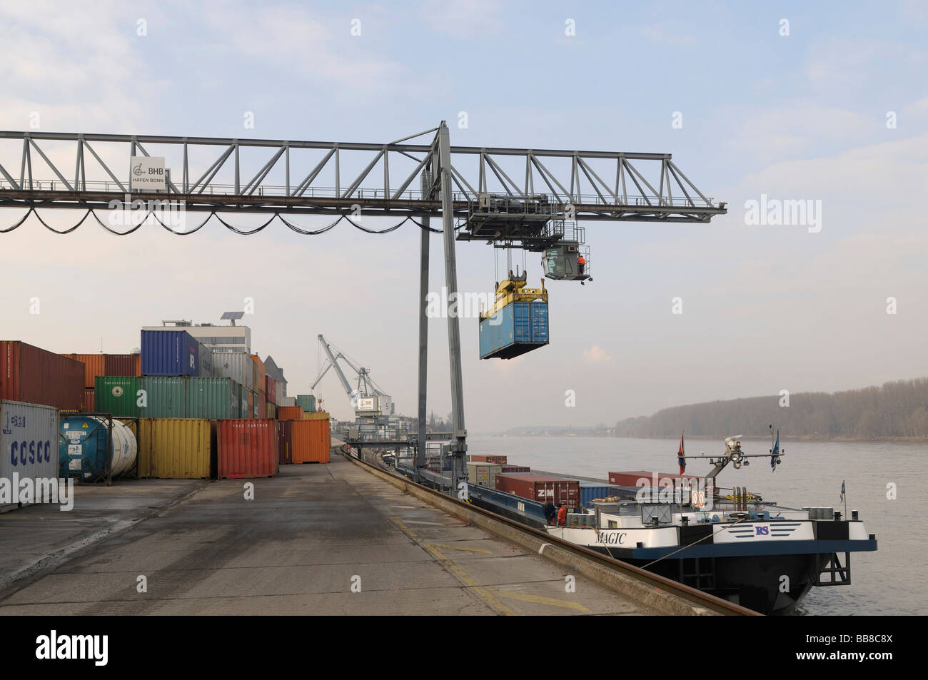 Port Of Bonn Bimodal Handling Gantry Crane Loading A Container Onto Stock Photo Alamy