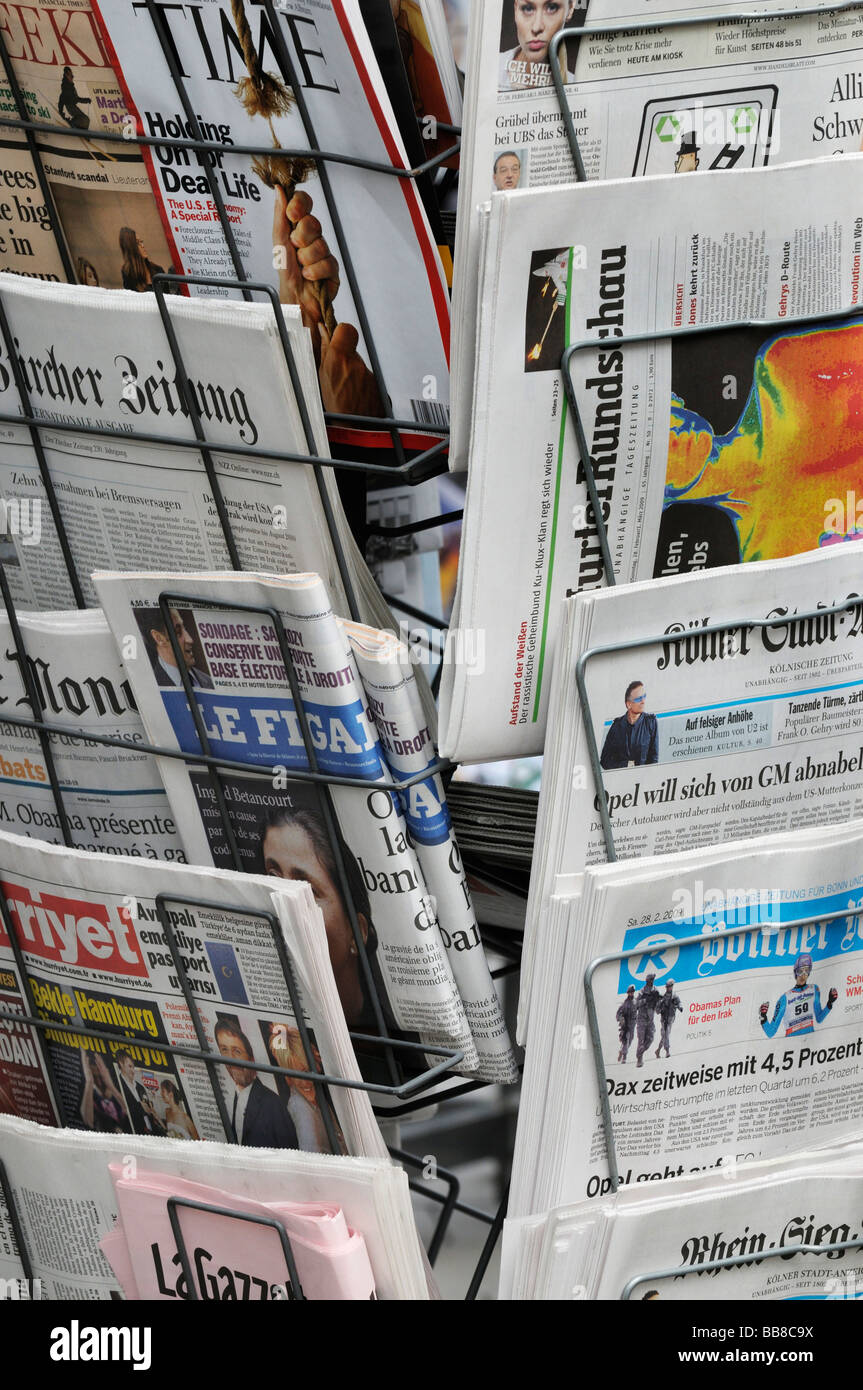 News rack with international daily newspapers Stock Photo