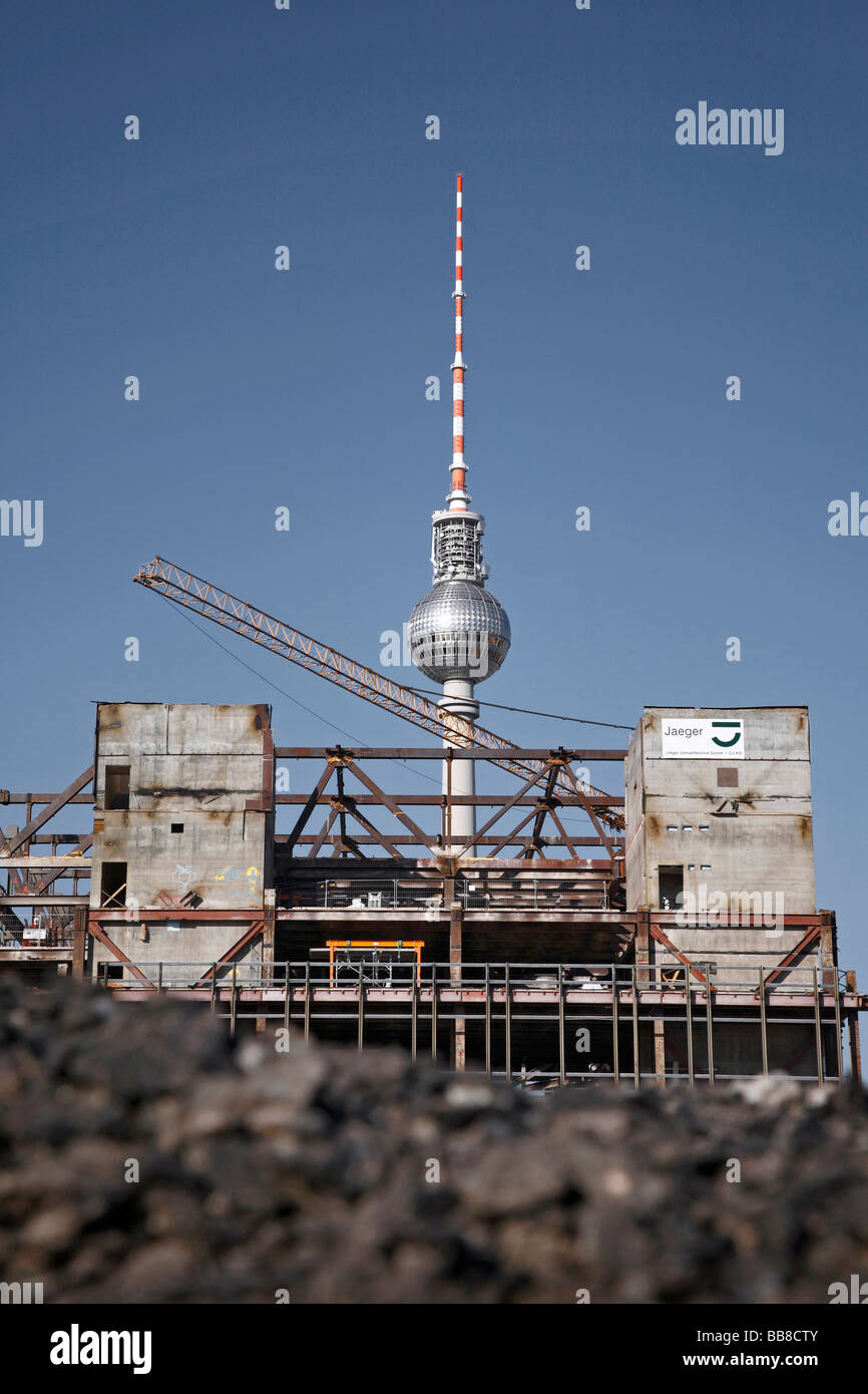 Berlin television tower behind the Palast der Republik building, during renaturation, Berlin, Germany Stock Photo