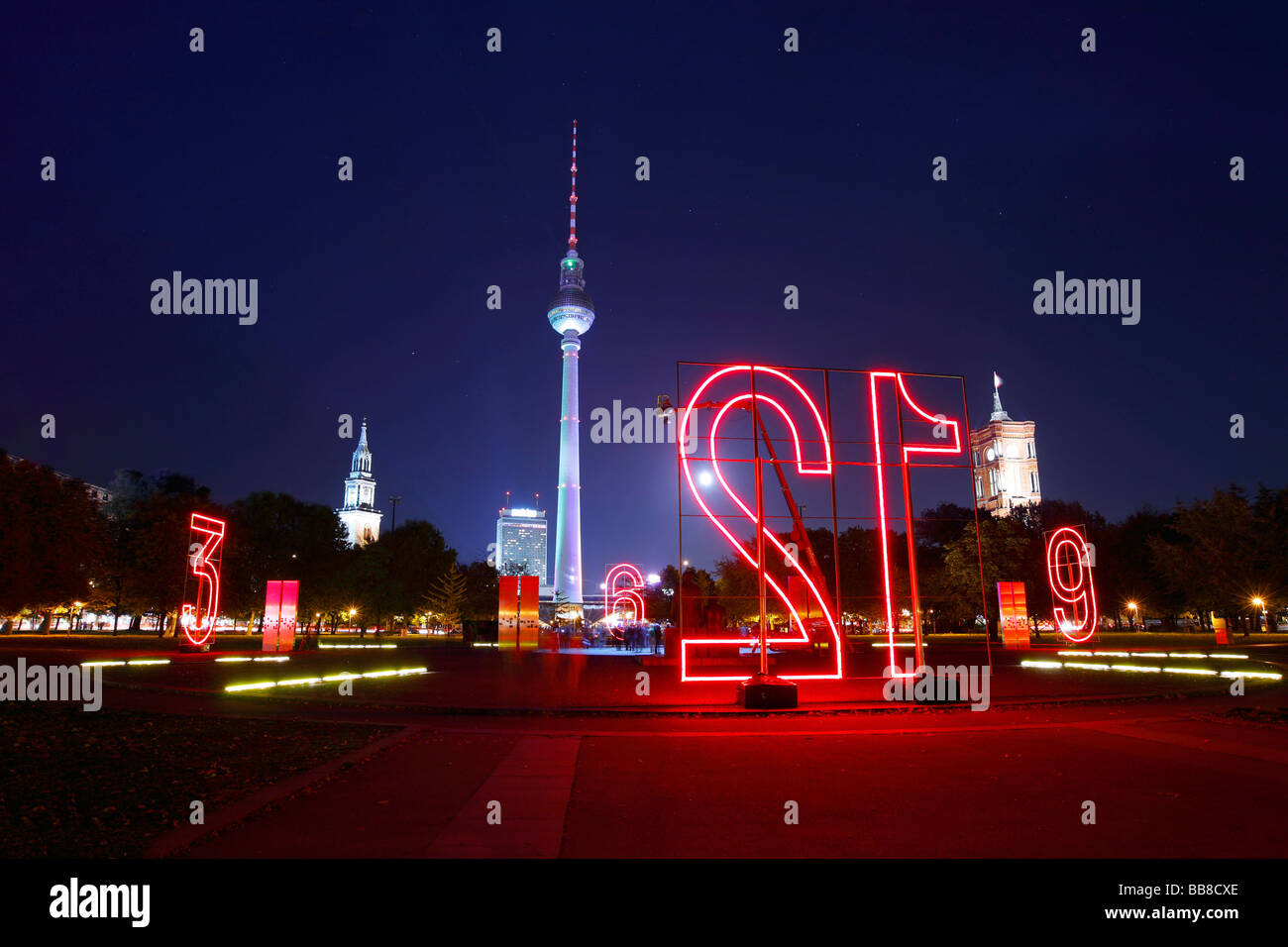 Fossil light clock in the Marx-Engels-Forum, in front of the television tower during the Festival of Lights in Berlin, Germany Stock Photo