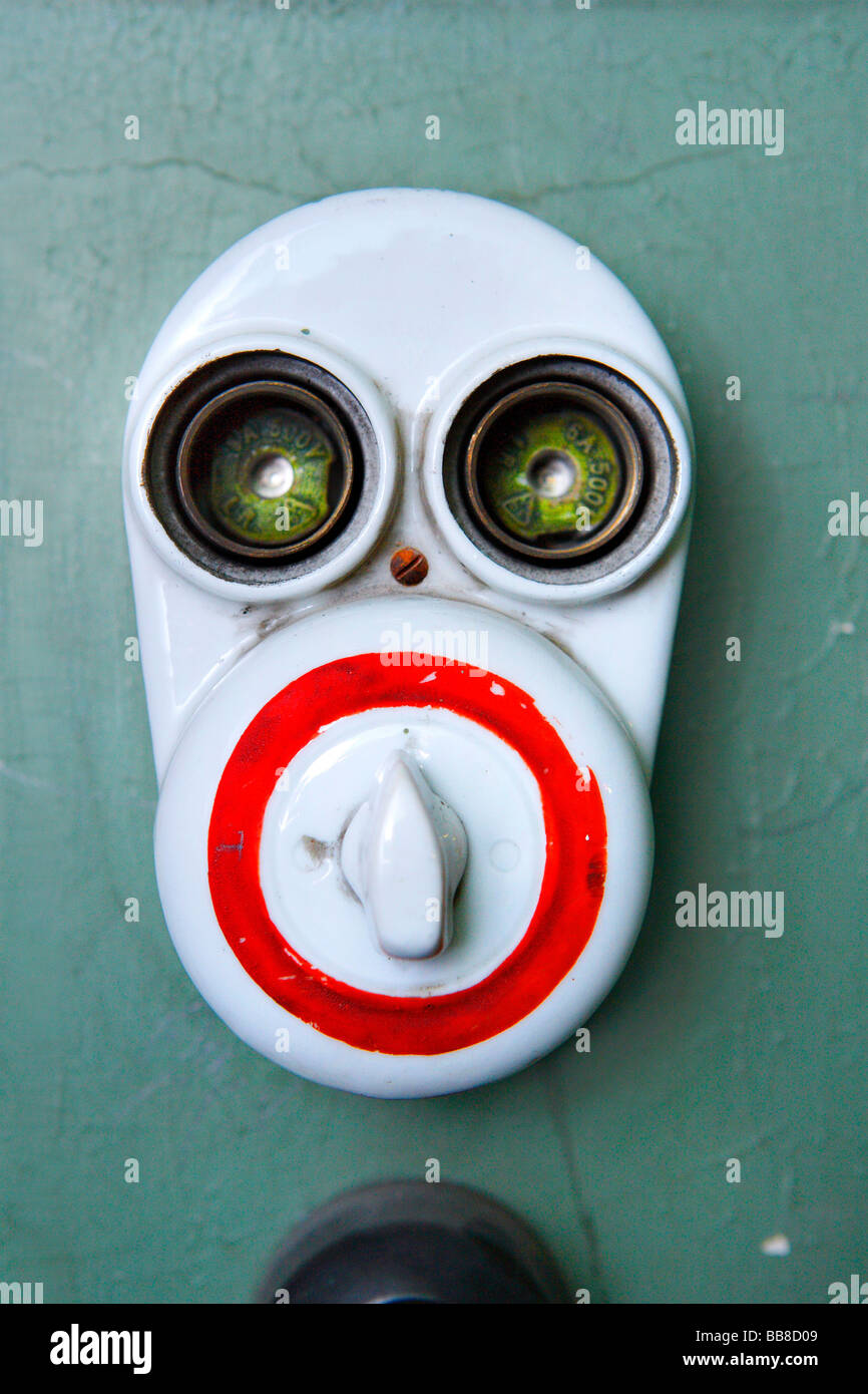 Face, electricity switch, fuse, old Stock Photo