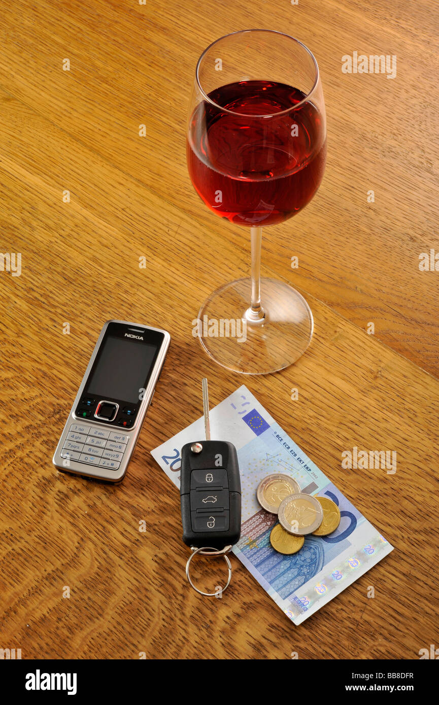 Red wine, car keys, symbolic of drink-driving Stock Photo