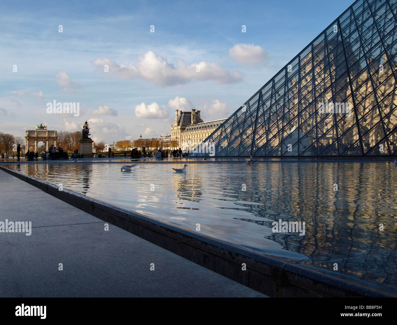 Louvre, pyramid and small triumphal arch, Paris, France, Europe Stock Photo
