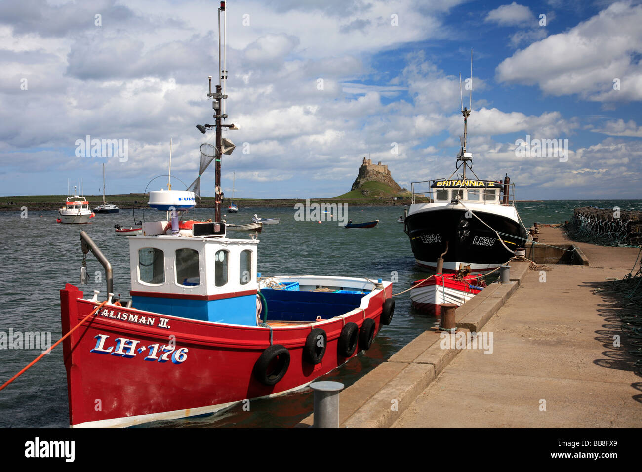 Fishing Boats in Harbour Holy Island Lindisfarne North Northumbrian Coast Northumbria County England UK Stock Photo