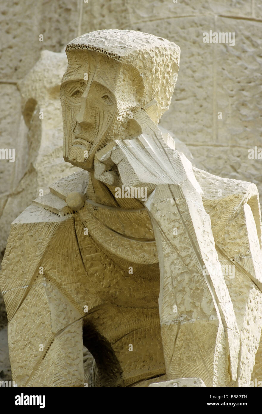 Mourner, modern stone sculpture of the frontage of the Passion, Cathedral La Sagrada Familia, Barcelona, Catalonia, Spain, Euro Stock Photo
