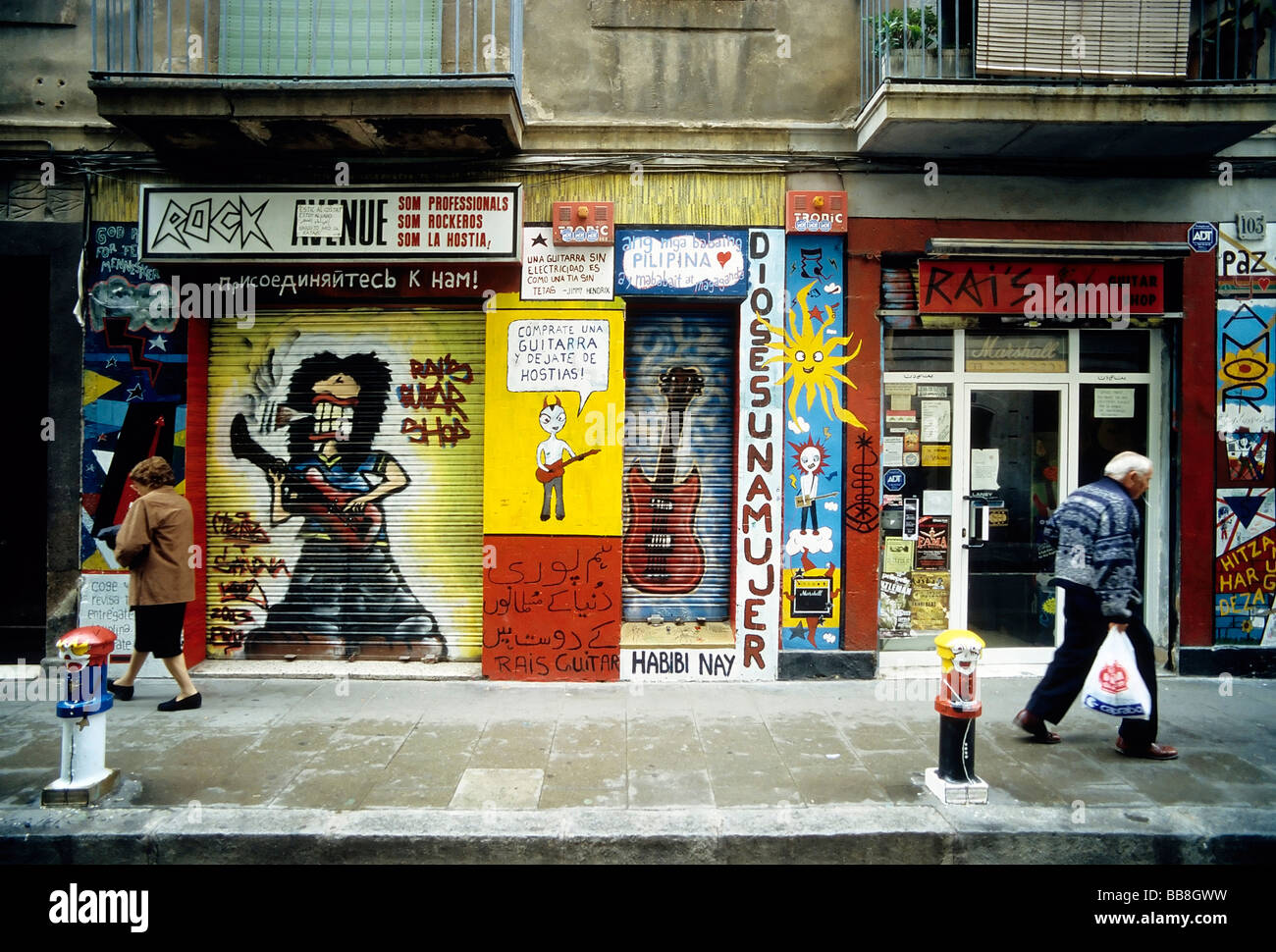 Pitoresque shop for rock-guitars, shutters and frontage painted wildly, historic district Barri Gòtic, Barcelona, Catalonia, Sp Stock Photo